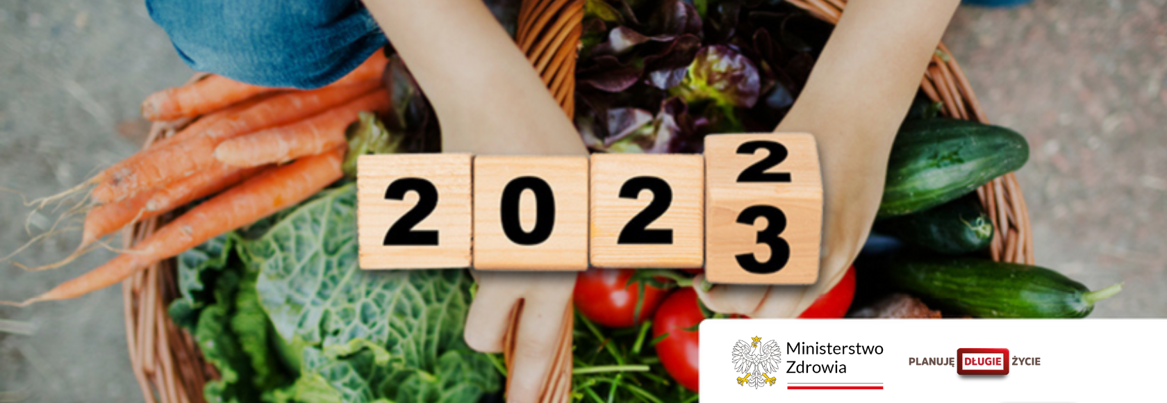 warzywa dłonie i napis 2023
