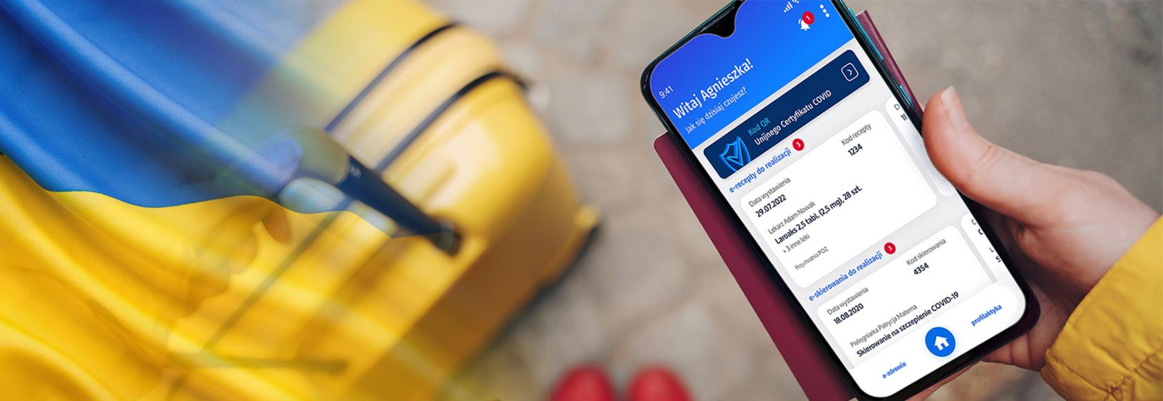 telefon z receptą, w tle walizka, ukr