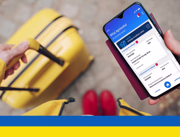 telefon z receptą, w tle walizka, ukr