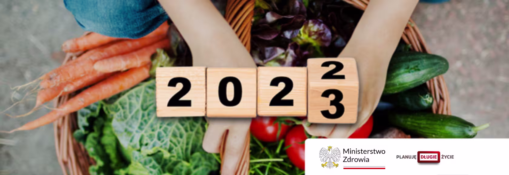 warzywa dłonie i napis 2023